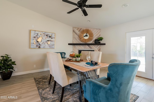 dining area with ceiling fan, baseboards, vaulted ceiling, recessed lighting, and wood finished floors