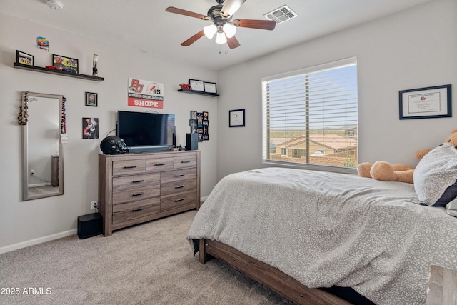 4418 W Yoosooni Dr, New River, AZ 85087 - bedroom featuring light colored carpet and a ceiling fan