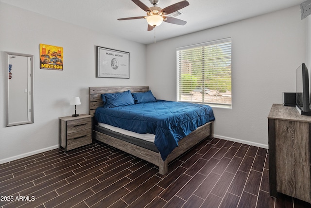 4418 W Yoosooni Dr, New River, AZ 85087 - bedroom featuring dark wood finished floors and a ceiling fan