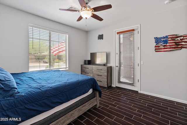 4418 W Yoosooni Dr, New River, AZ 85087 - bedroom featuring dark wood-type flooring and ceiling fan