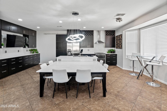 4418 W Yoosooni Dr, New River, AZ 85087 - dining room featuring a chandelier, light tile patterned floors, and recessed lighting