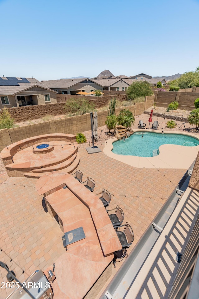 4418 W Yoosooni Dr, New River, AZ 85087 - view of pool featuring a patio, a fenced backyard, and a fire pit
