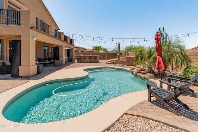 4418 W Yoosooni Dr, New River, AZ 85087 - view of pool with a patio and an outdoor hangout area