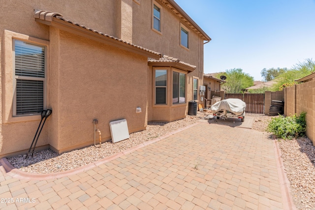 4418 W Yoosooni Dr, New River, AZ 85087 - fenced backyard featuring a patio area