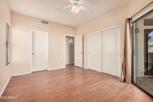 unfurnished bedroom featuring a closet, ceiling fan, and light wood-type flooring