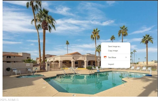 view of pool featuring a patio area