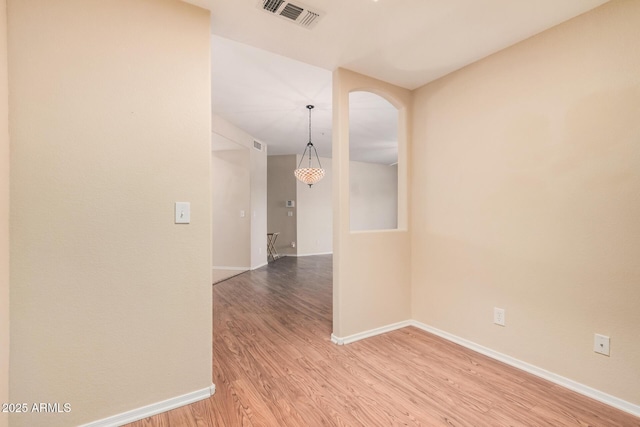 empty room featuring light hardwood / wood-style floors