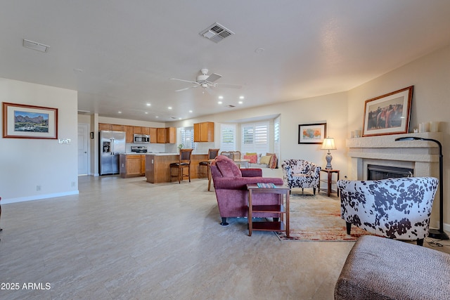 living room with ceiling fan