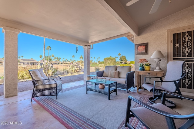 view of patio / terrace featuring ceiling fan and outdoor lounge area