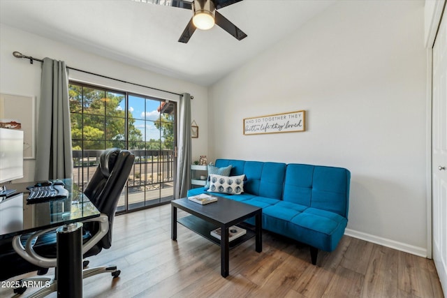 office featuring vaulted ceiling, wood finished floors, ceiling fan, and baseboards