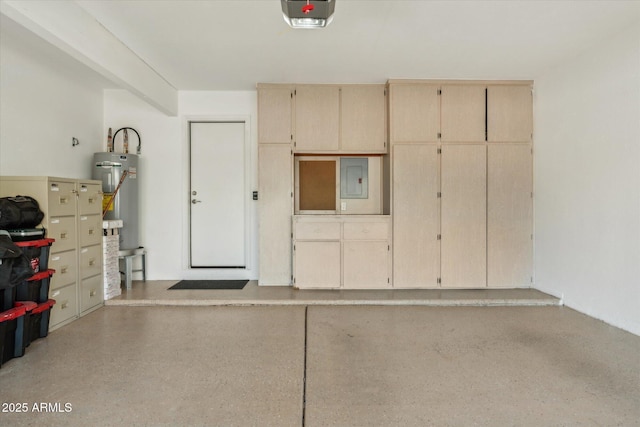 garage featuring gas water heater, a garage door opener, and electric panel