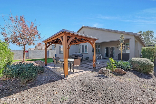 back of property featuring a patio area