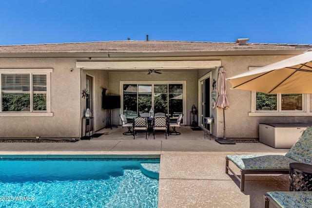 9922 E Thunderbolt Ave, Mesa, AZ 85212 - outdoor pool featuring a patio, ceiling fan, and outdoor dining space