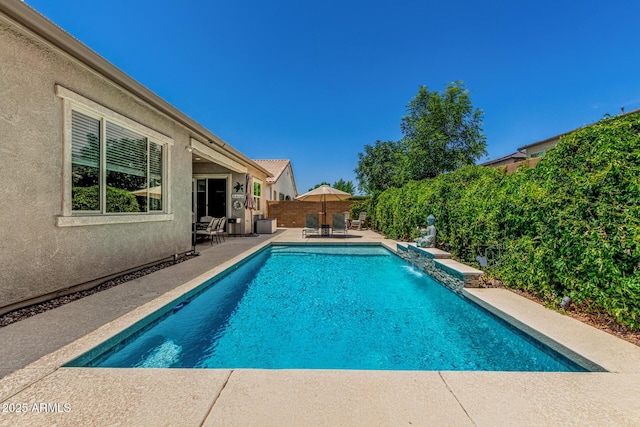 9922 E Thunderbolt Ave, Mesa, AZ 85212 - view of swimming pool featuring a patio area, outdoor dining area, and a fenced backyard
