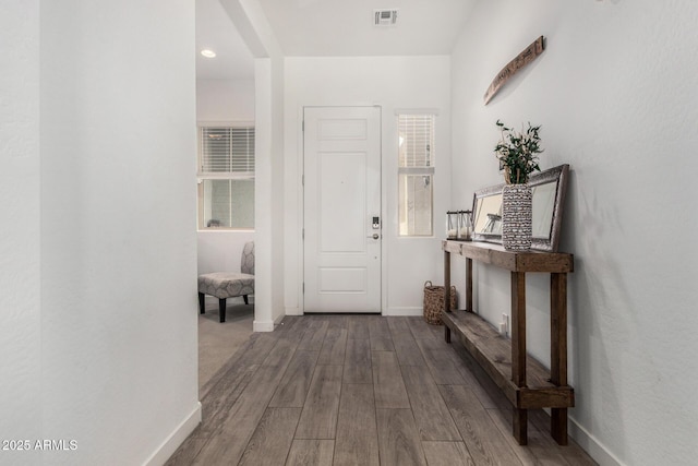 9922 E Thunderbolt Ave, Mesa, AZ 85212 - entryway with wood finished floors, baseboards, and plenty of natural light