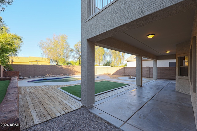 view of patio / terrace featuring a fenced in pool