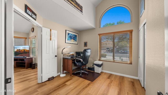1910 E Citation Ln, Tempe, AZ 85284 - home office with wood finished floors, baseboards, and plenty of natural light