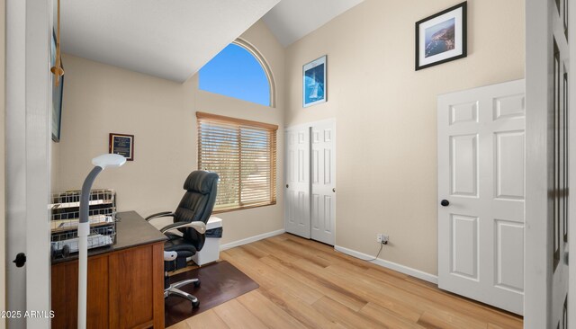 1910 E Citation Ln, Tempe, AZ 85284 - home office with high vaulted ceiling, plenty of natural light, light wood-style floors, and baseboards