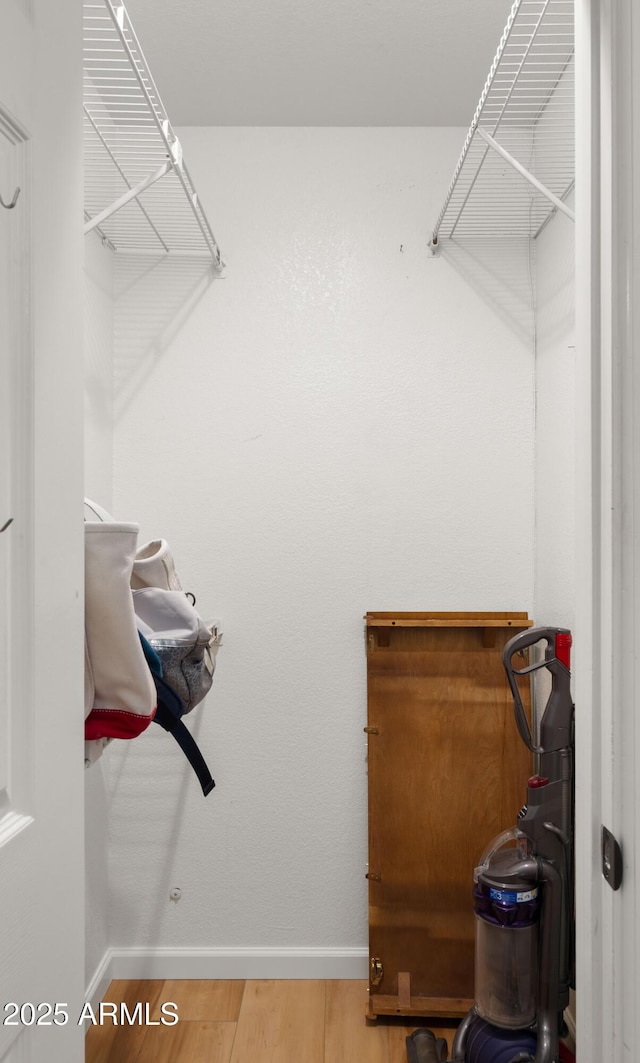 1910 E Citation Ln, Tempe, AZ 85284 - spacious closet featuring wood finished floors