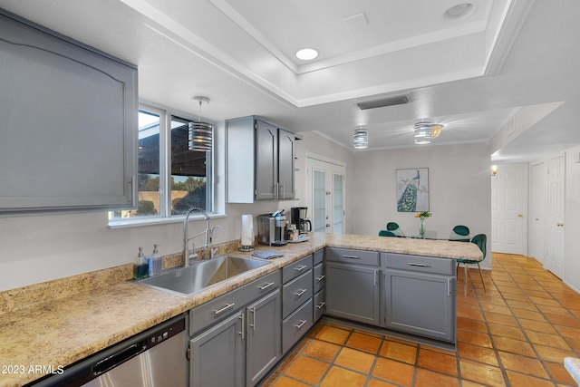 kitchen featuring kitchen peninsula, gray cabinetry, dishwasher, and sink