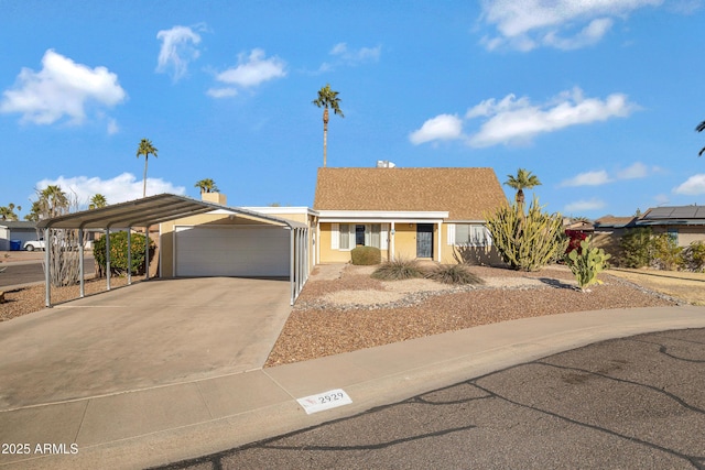 single story home with a carport and a garage