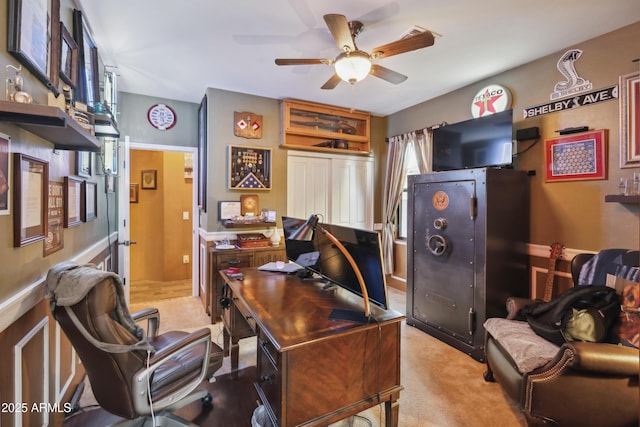 office with ceiling fan and carpet floors