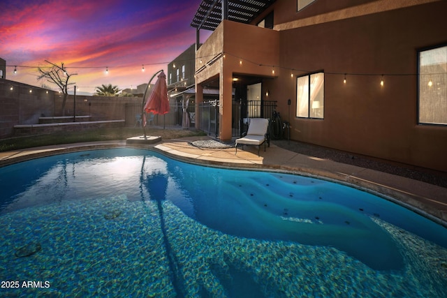 view of swimming pool with a fenced in pool, a patio, and a fenced backyard