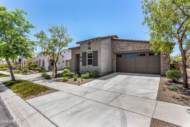 view of front of property featuring a garage