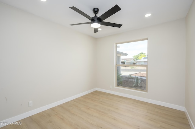 unfurnished room featuring baseboards, a ceiling fan, recessed lighting, and light wood-style flooring