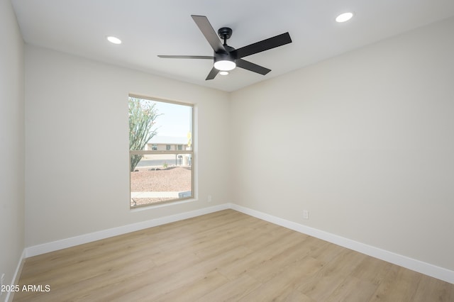 empty room featuring baseboards, recessed lighting, light wood-style flooring, and ceiling fan