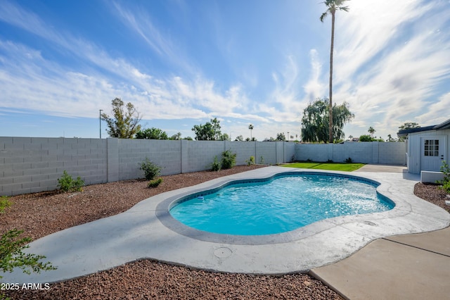 view of pool with a fenced in pool, a fenced backyard, and a patio area