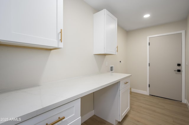 clothes washing area with baseboards, light wood-type flooring, recessed lighting, washer hookup, and hookup for an electric dryer