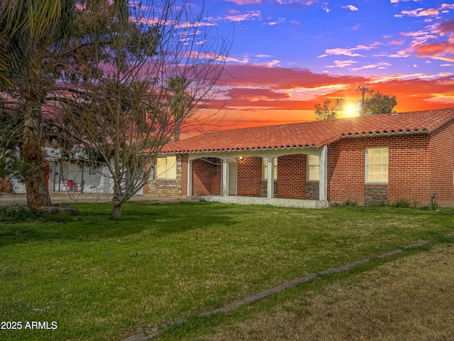 1736 E Coronado Rd, Phoenix, AZ 85006 - view of front of house with brick siding, a yard, and a tiled roof