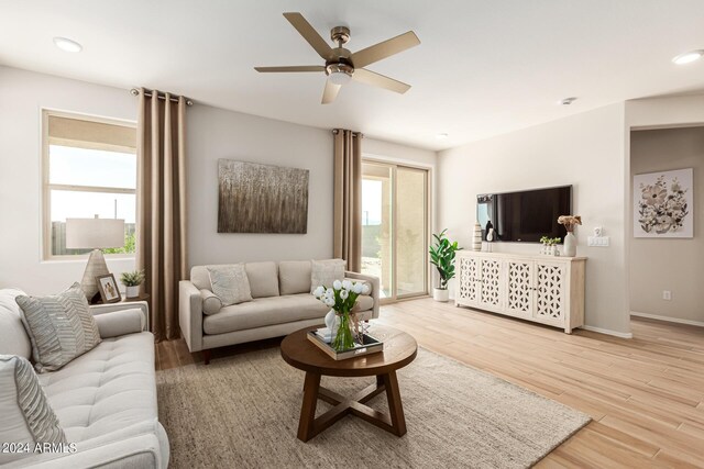 18197 W Cielo Grande Ave, Surprise, AZ 85387 - living room with wood-type flooring and ceiling fan