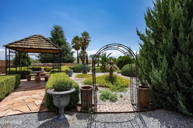 exterior space featuring a gazebo and a patio area