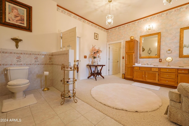 bathroom with tile patterned flooring, vanity, and toilet