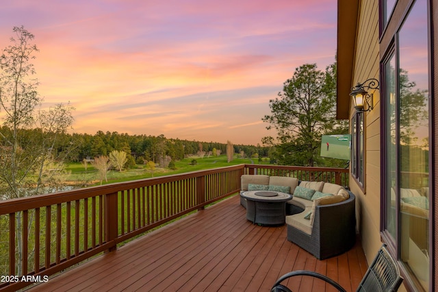 deck featuring a fire pit