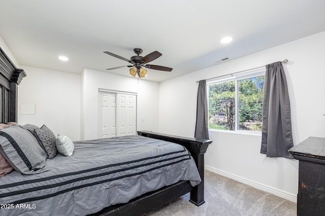 bedroom with recessed lighting, visible vents, baseboards, a closet, and carpet