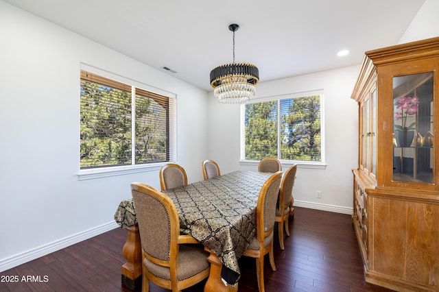 dining room featuring visible vents, baseboards, dark wood-style flooring, a chandelier, and recessed lighting