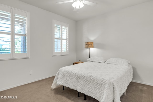 4279 N Spyglass Dr, Florence, AZ 85132 - carpeted bedroom featuring ceiling fan and baseboards