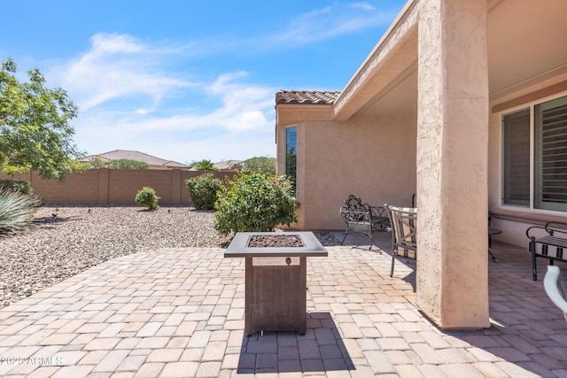 4279 N Spyglass Dr, Florence, AZ 85132 - view of patio featuring outdoor dining space, an outdoor fire pit, and fence private yard