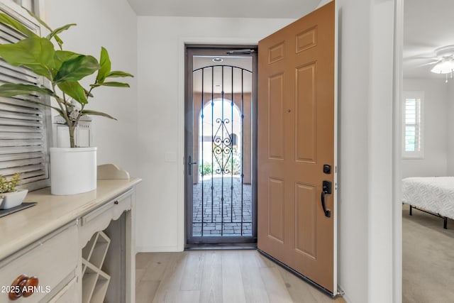 4279 N Spyglass Dr, Florence, AZ 85132 - foyer featuring light wood-style flooring and baseboards
