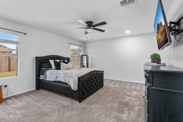 654 E Buckingham Ave, Gilbert, AZ 85297 - bedroom with light carpet and a ceiling fan