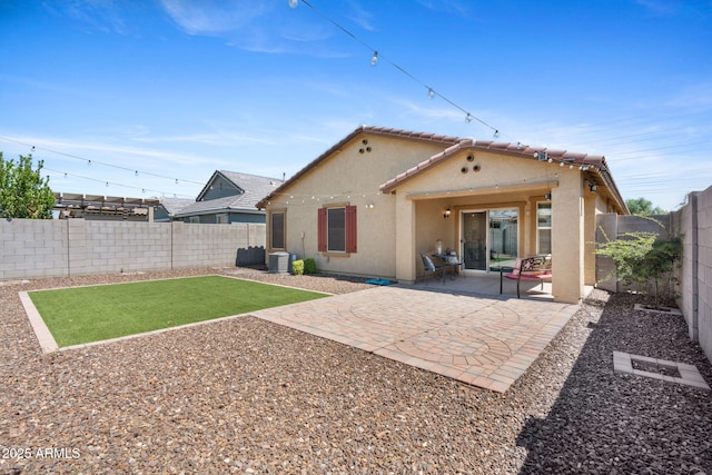 654 E Buckingham Ave, Gilbert, AZ 85297 - rear view of property with stucco siding, a tile roof, a fenced backyard, and a patio area