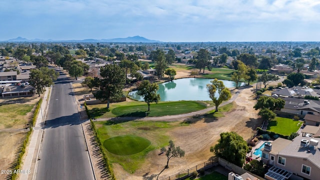 birds eye view of property featuring a water and mountain view