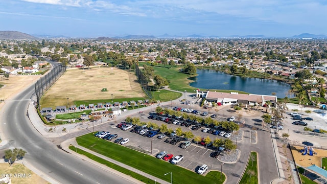 bird's eye view with a water and mountain view