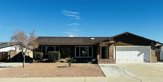 single story home with a garage