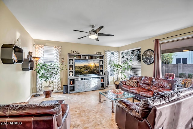 living room featuring ceiling fan