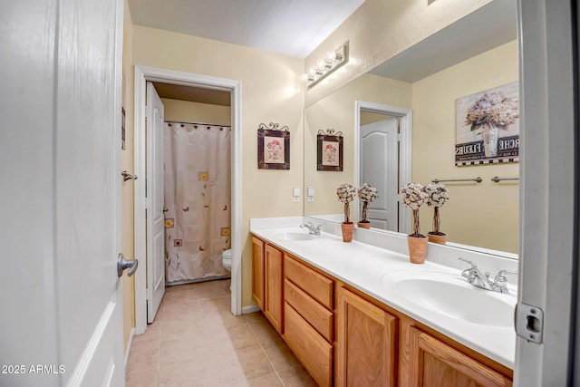 bathroom with toilet, tile patterned flooring, a shower with shower curtain, and vanity