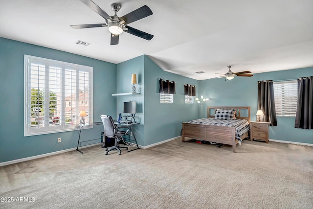 carpeted bedroom featuring ceiling fan